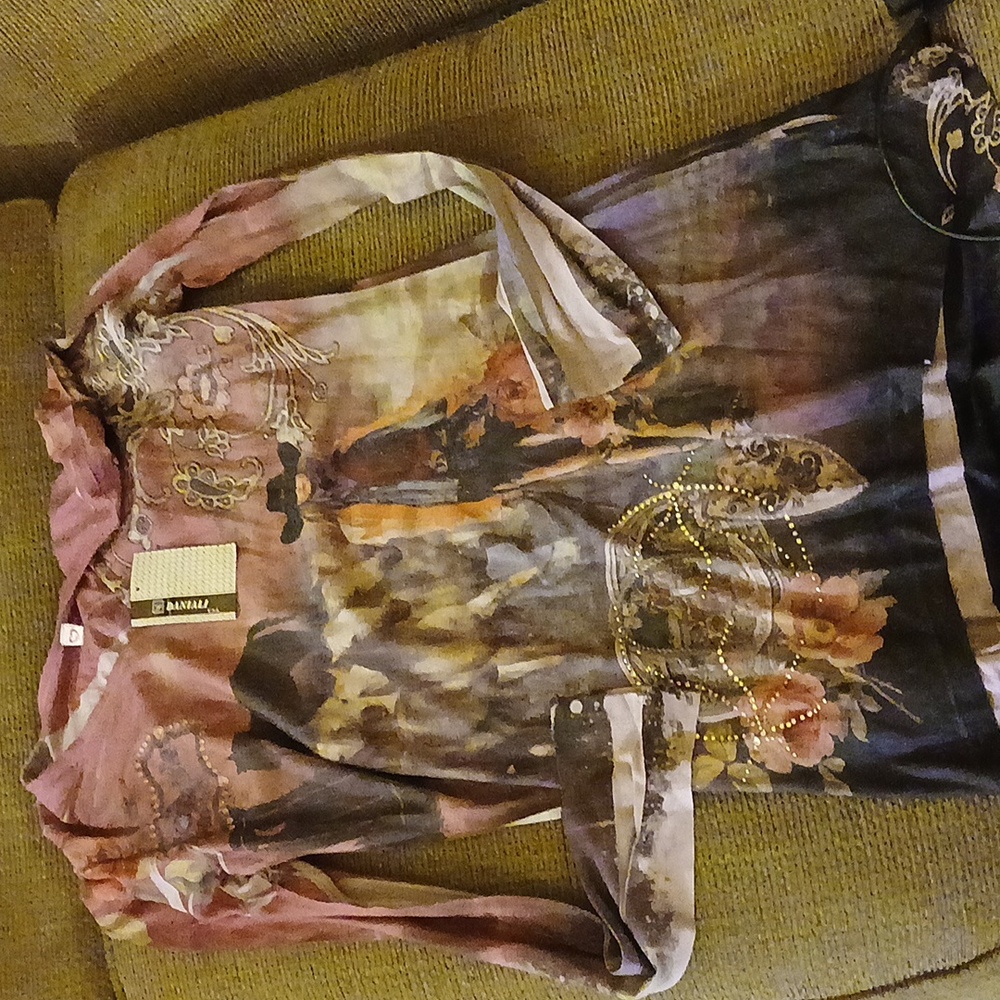 Daniali long sleeve Rodeo influence top.